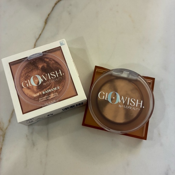 HUDA BEAUTY Other - Huda Glowish beauty bronzing powder in Tan Light. Brand new! Famous makeup!